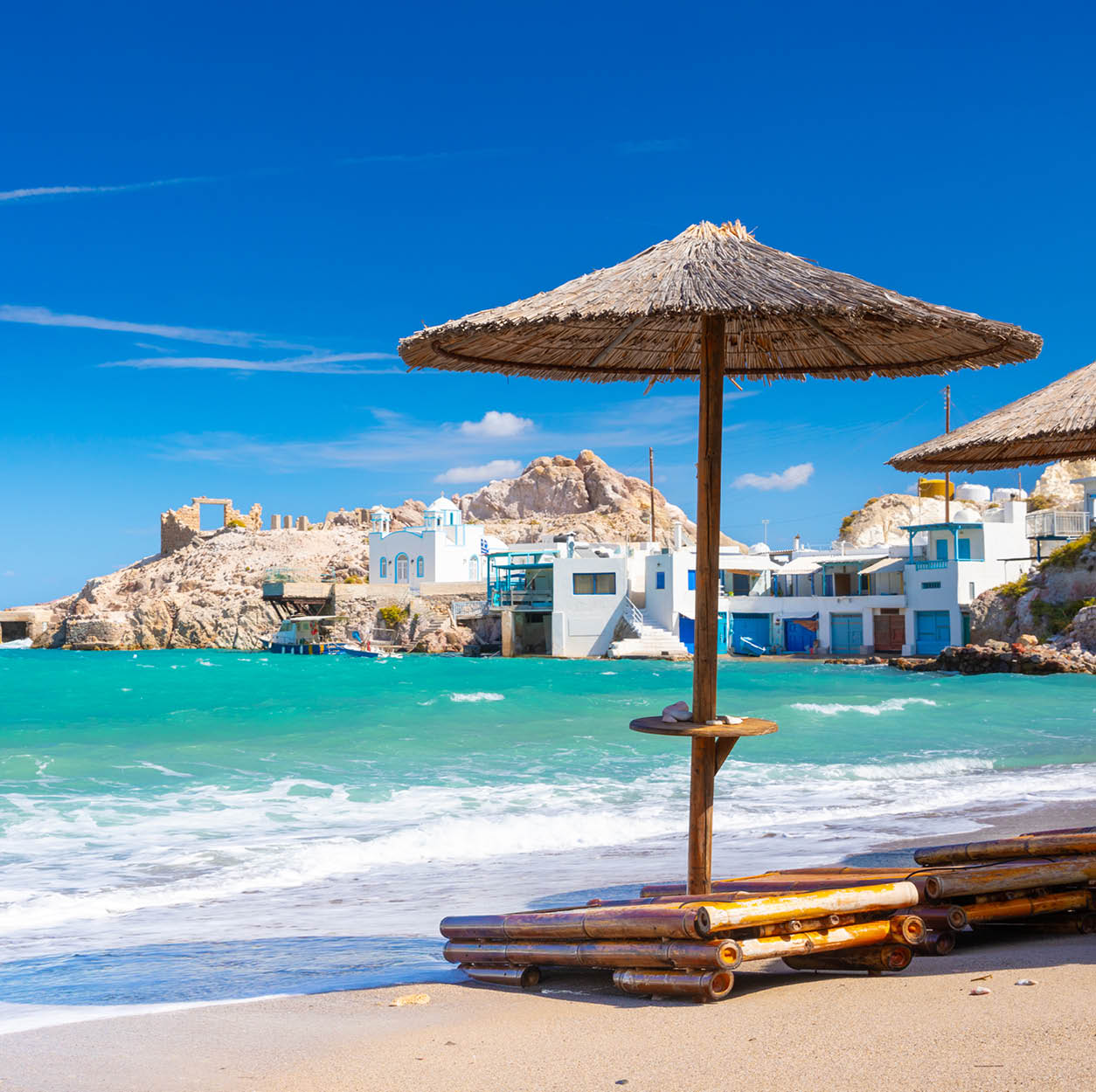 Beach and fishing village of Firapotamos on Milos island, Greece. High quality photo