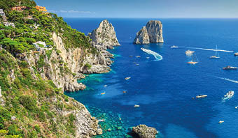 Amazing Faraglioni cliffs panorama with the majestic Tyrrhenian sea in background, Capri island, Campania region, Italy, Europe
