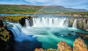 The Godafoss (Icelandic: waterfall of the gods) is a famous waterfall in Iceland. The breathtaking landscape of Godafoss waterfall attracts tourist to visit the Northeastern Region of Iceland.