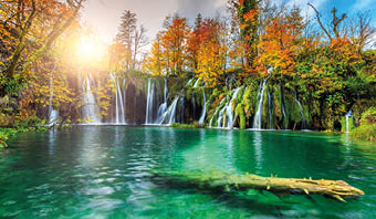 Stunning colorful autumn landscape with spectacular lake and waterfalls in Plitvice lakes National Park, Croatia, Europe