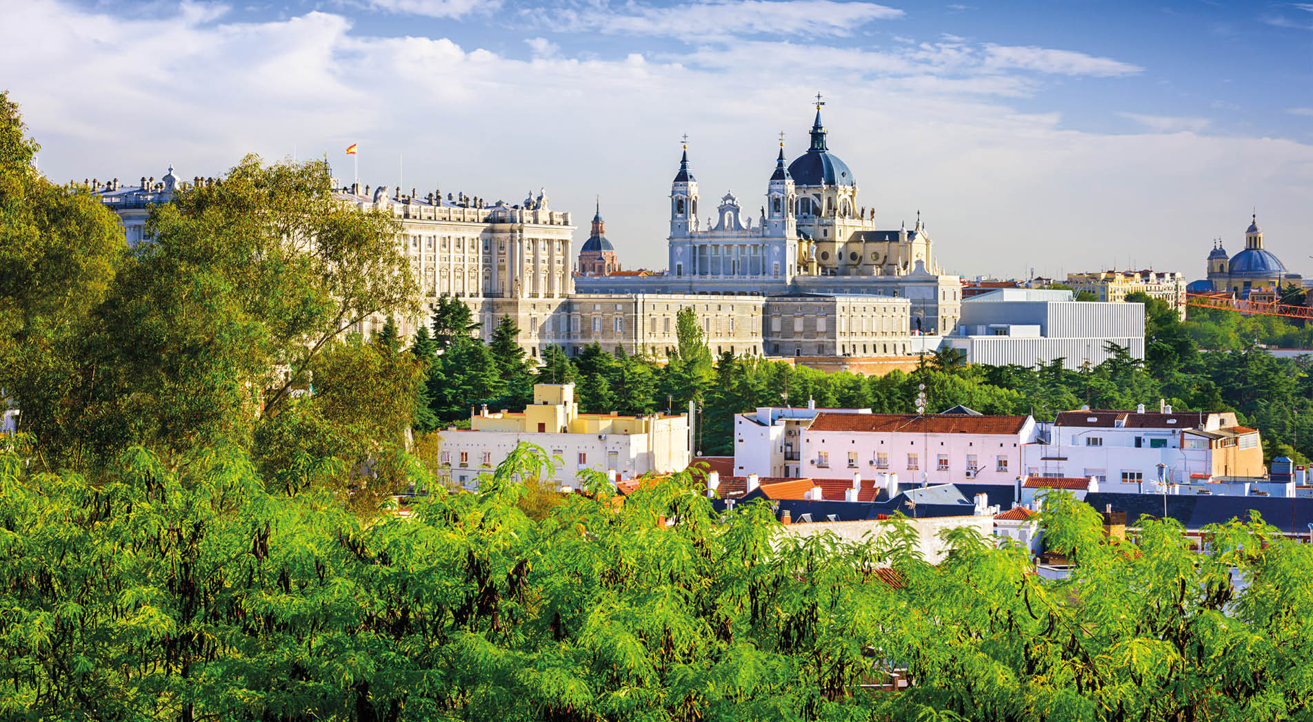 Madrid, Spain skyline at Santa Maria la Real de La Almudena Cathedral and the Royal Palace.