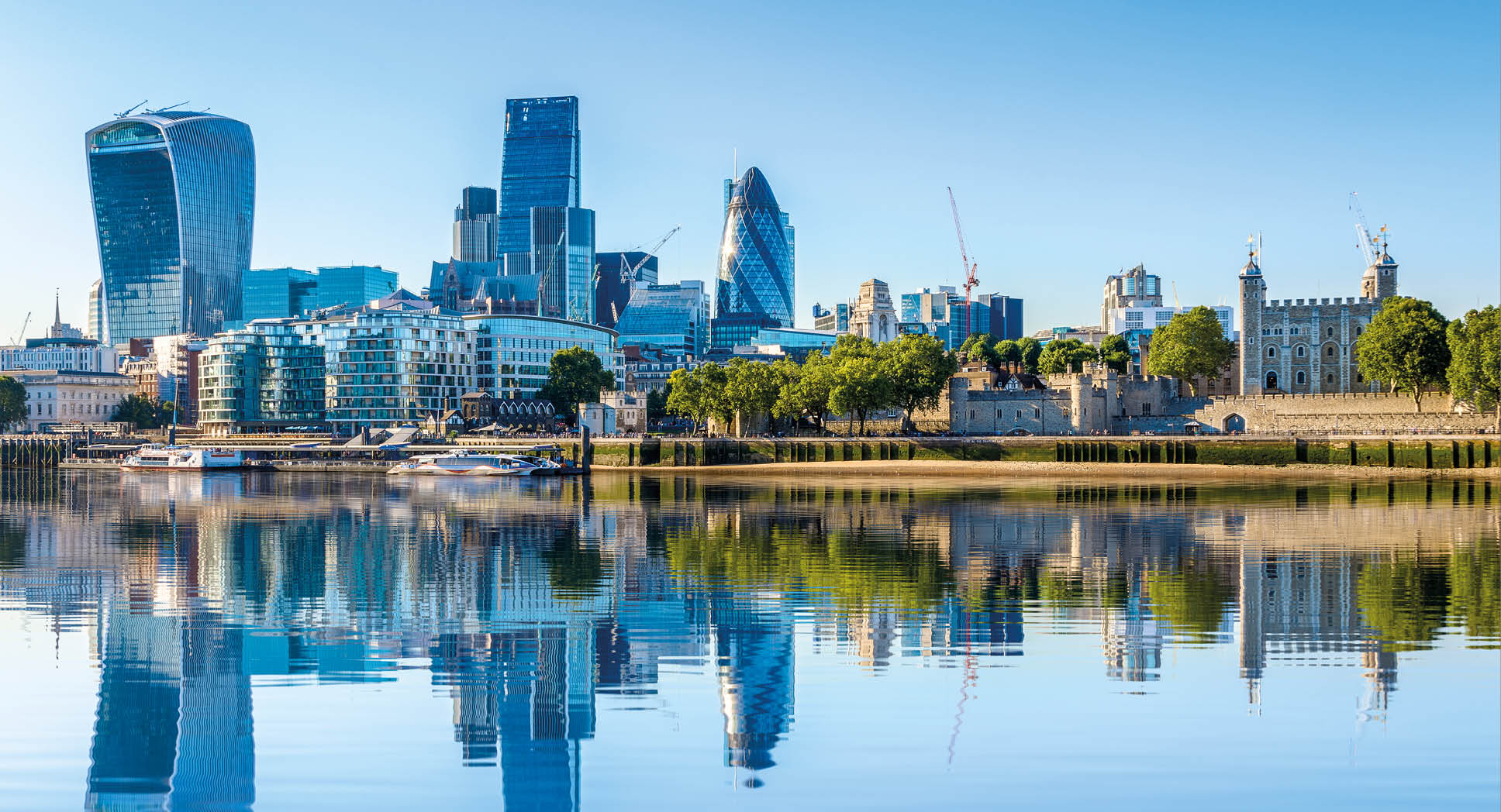 Cloudless day at financial district of London, including The Gherkin, Fenchurch building and Leadenhall building