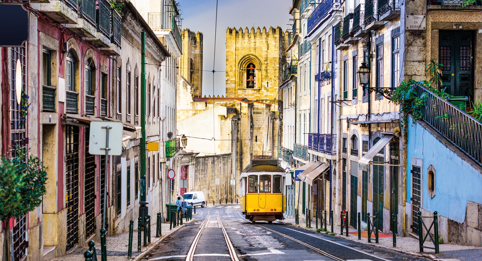 Lisbon, Porgugal cityscape and tram near Lisbon Cathedral.