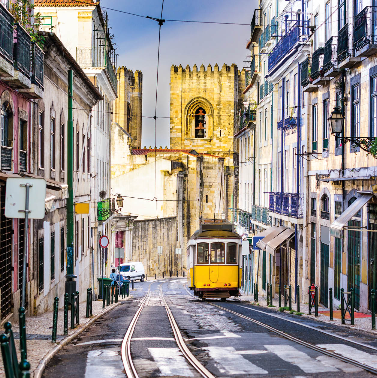 Lisbon, Porgugal cityscape and tram near Lisbon Cathedral.