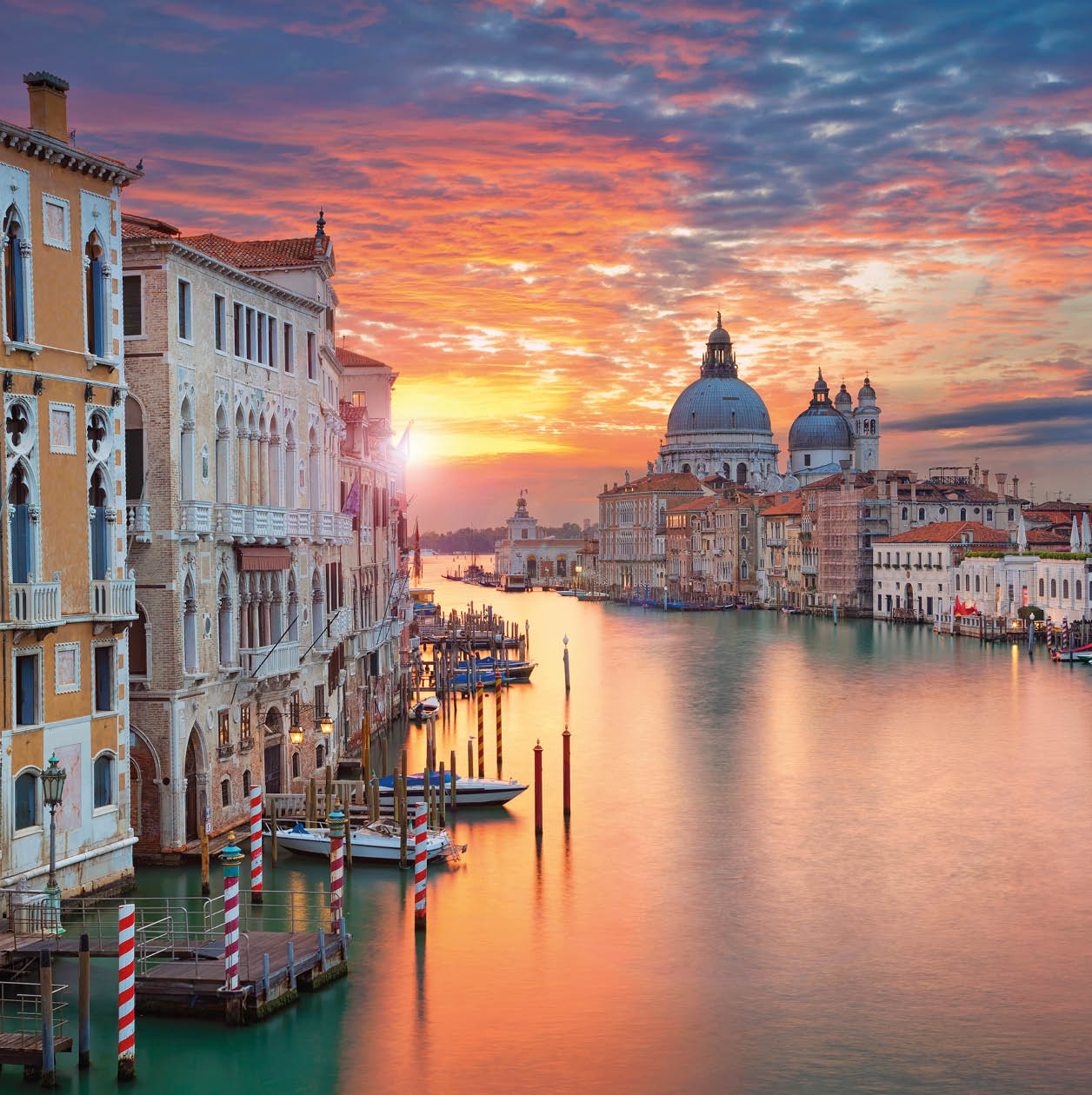 Image of Grand Canal in Venice, with Santa Maria della Salute Basilica in the background.