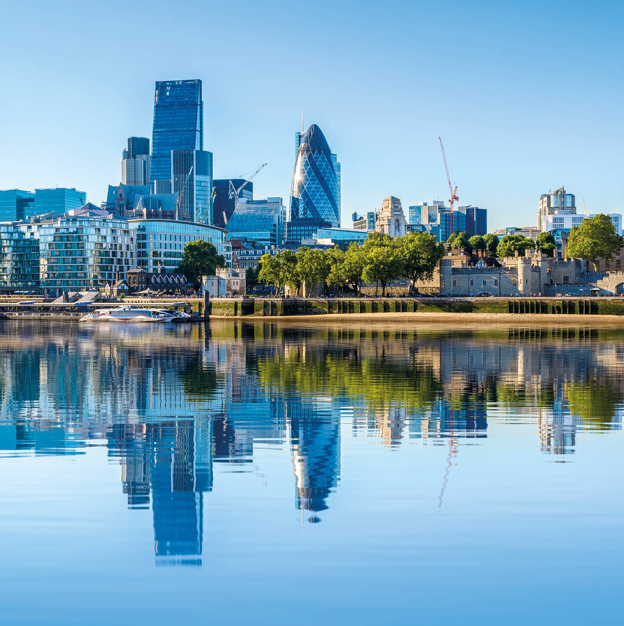 Cloudless day at financial district of London, including The Gherkin, Fenchurch building and Leadenhall building