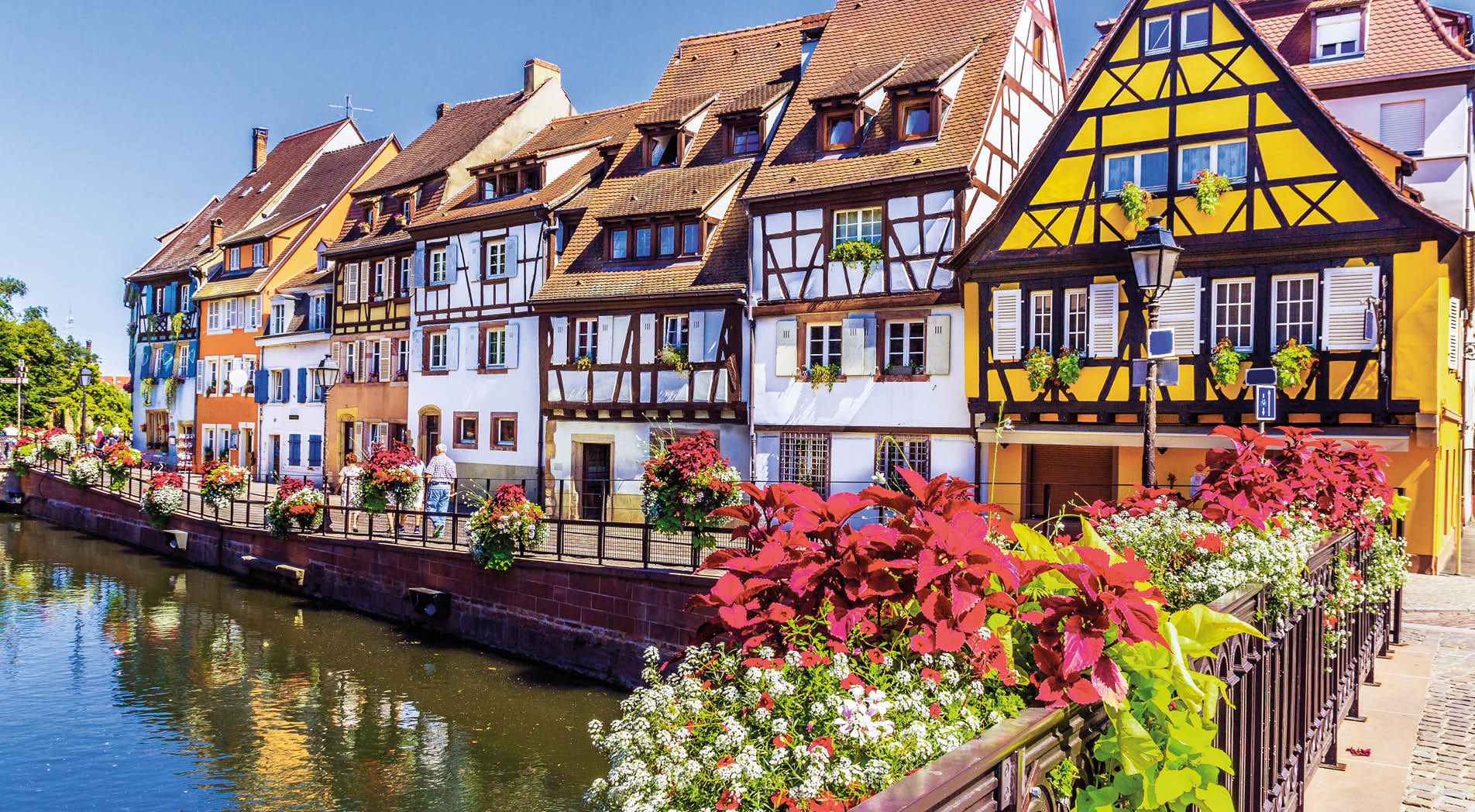 Colmar, Alsace, France. Petit Venice, water canal and traditional half timbered houses.