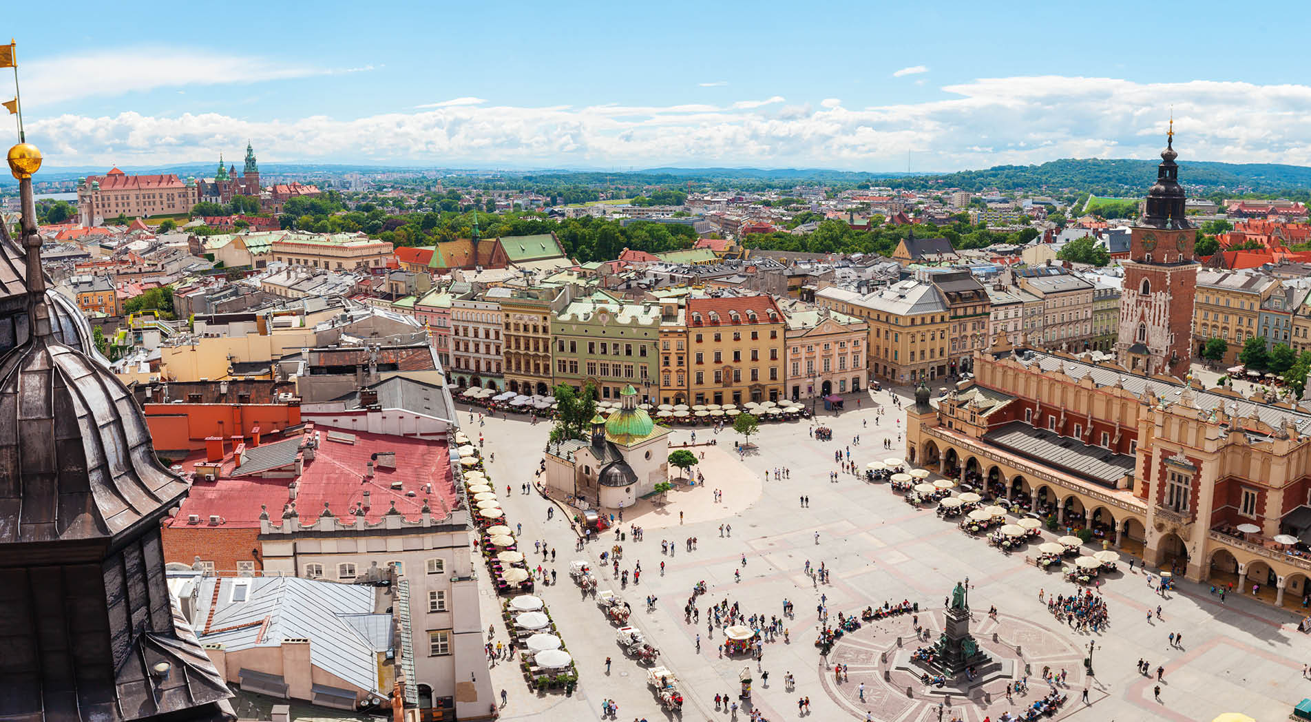 Aerial view on the central square and Sukiennice in Krakow. Market Square from the tower of the church of St. Mary. Poland. Cloth Hall.