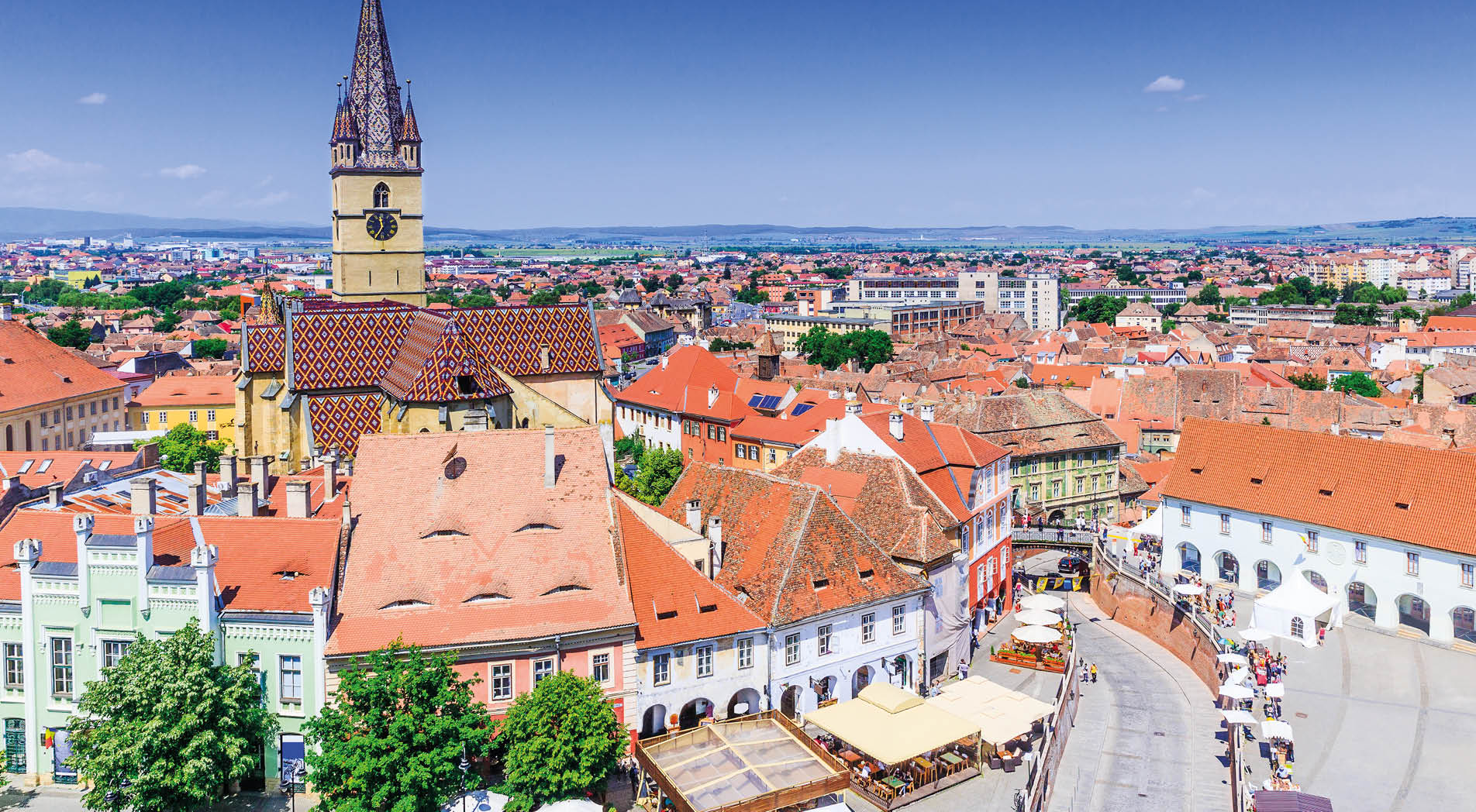 Sibiu, Romania, Lutheran cathedral tower and Small Square (Piata Mica).