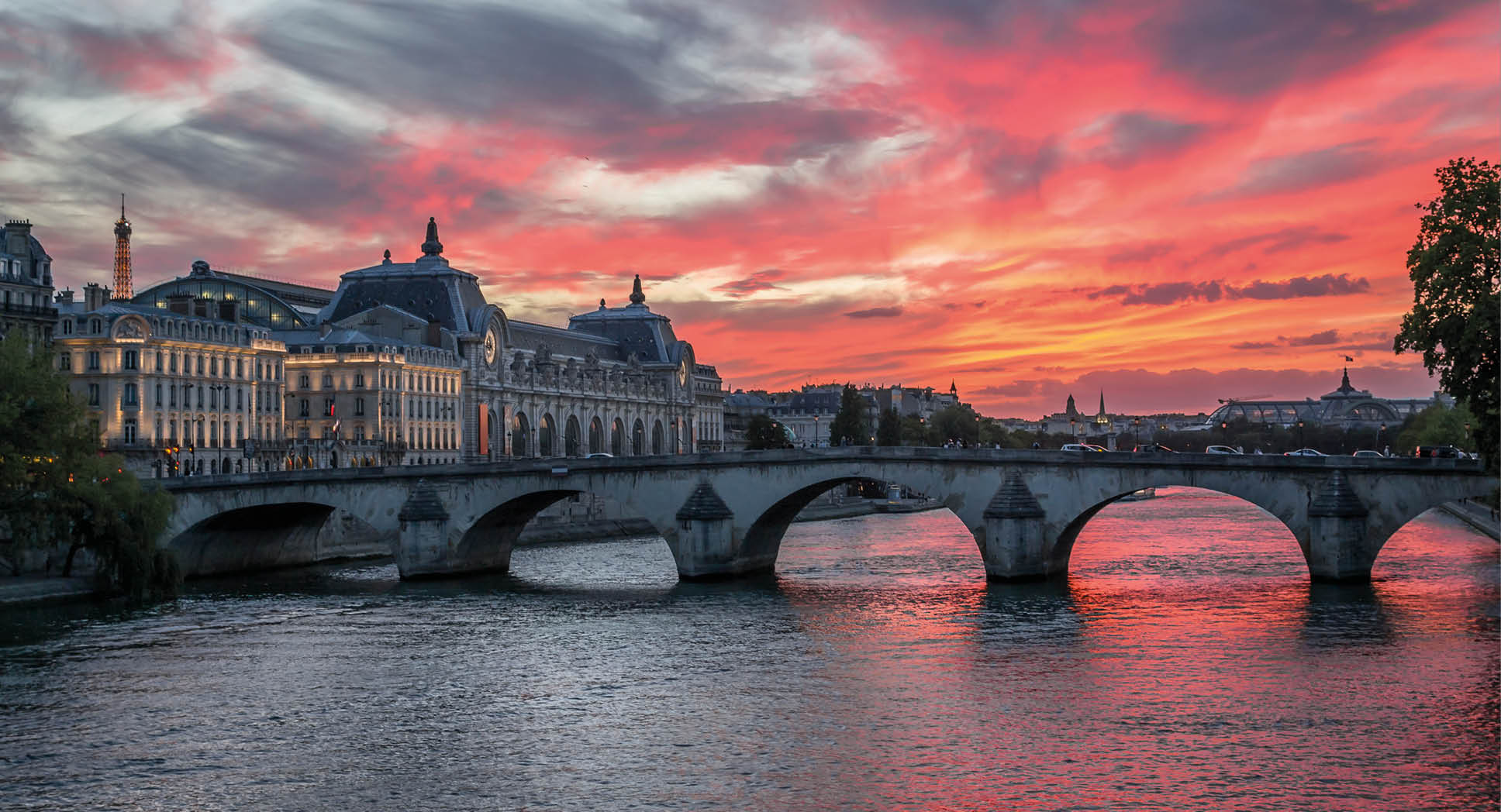 Red afterglow over the River Seine in Paris, France