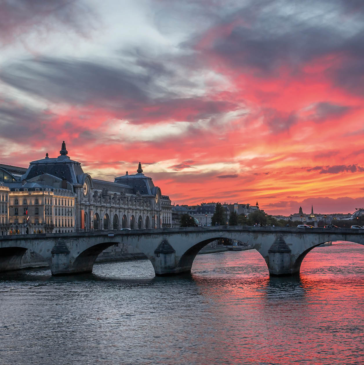 Red afterglow over the River Seine in Paris, France