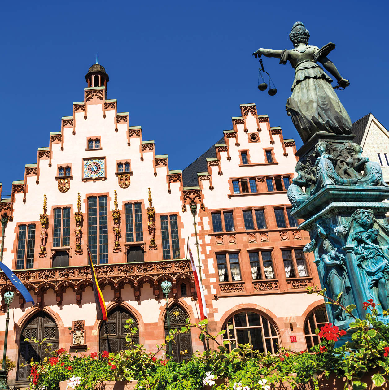 “Frankfurt RAmer and Statue of Justice The RAmer, which has been used as a city hall for over 600 years, is one of the most historicially significant builidings in Germany."