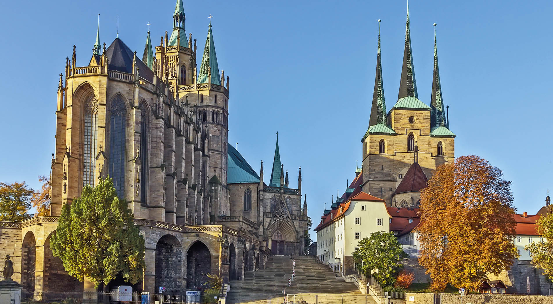 Erfurt Cathedral and Severikirche,Germany. Both churches tower above the town scape and are accessible via huge open stairs called Domstufen.