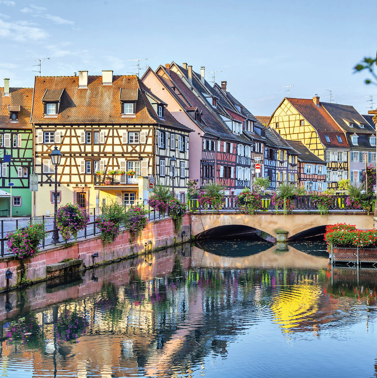 Colorful traditional french houses on the side of river Lauch in Petite Venise, Colmar, France