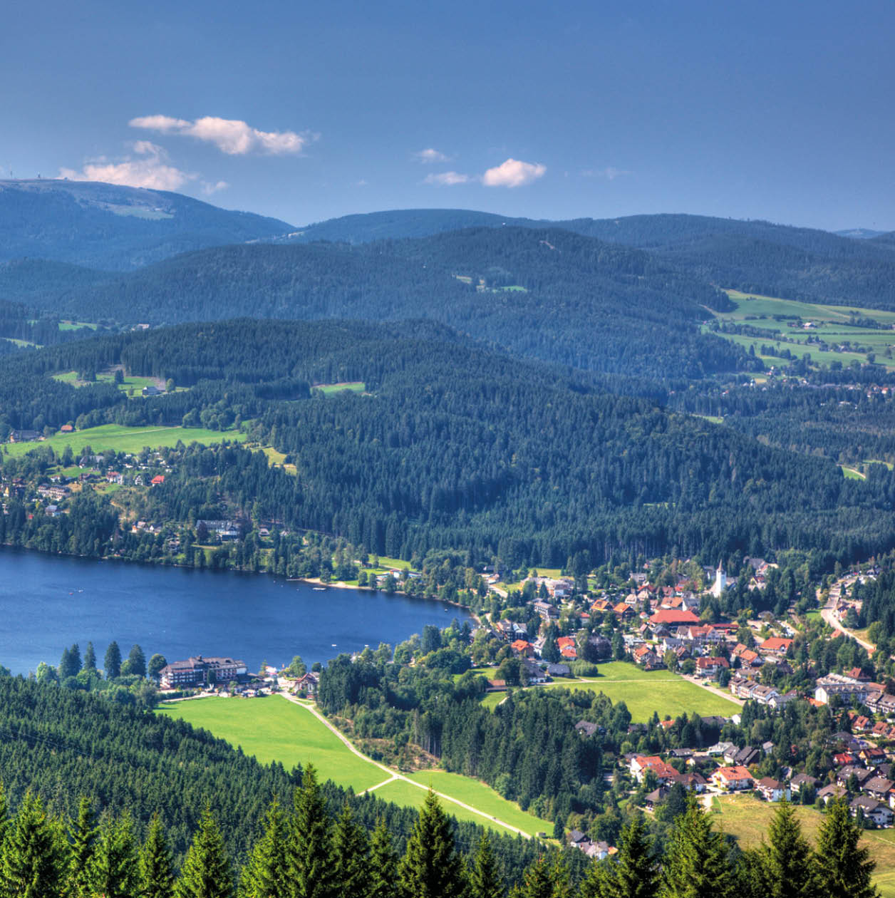 View of the lake titisee and the mountain Feldberg, which is the hightest mountain in the black forest
