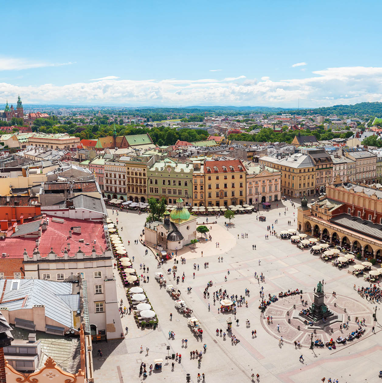 Aerial view on the central square and Sukiennice in Krakow. Market Square from the tower of the church of St. Mary. Poland. Cloth Hall.