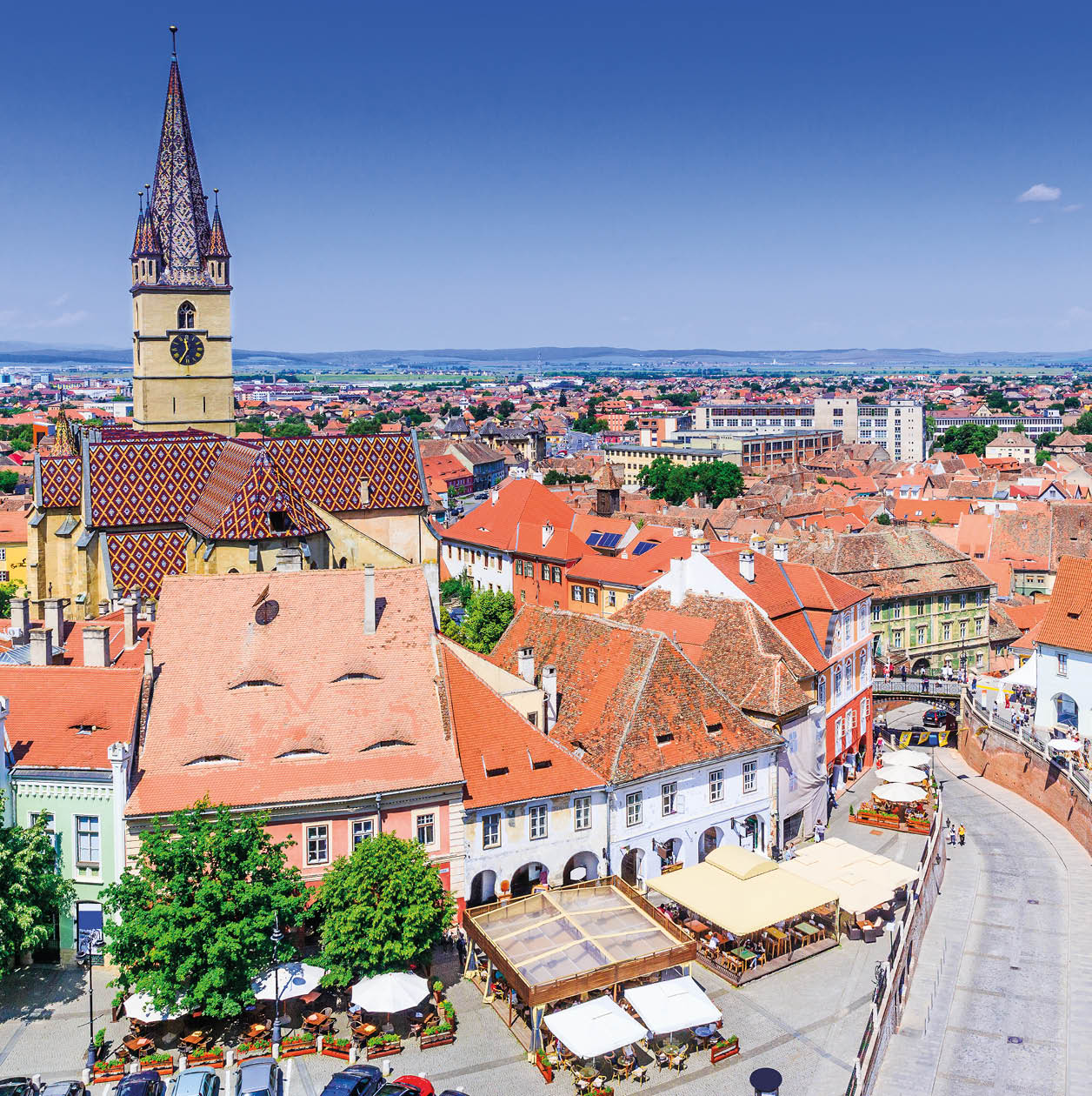 Sibiu, Romania, Lutheran cathedral tower and Small Square (Piata Mica).