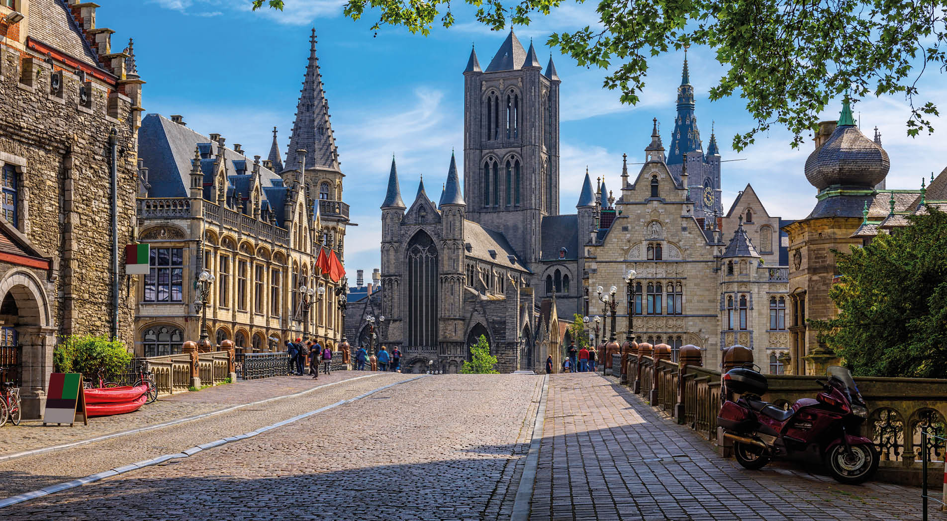 Medieval city of Gent (Ghent) in Flanders with Saint Nicholas Church and Gent Town Hall, Belgium. Cityscape of Ghent.