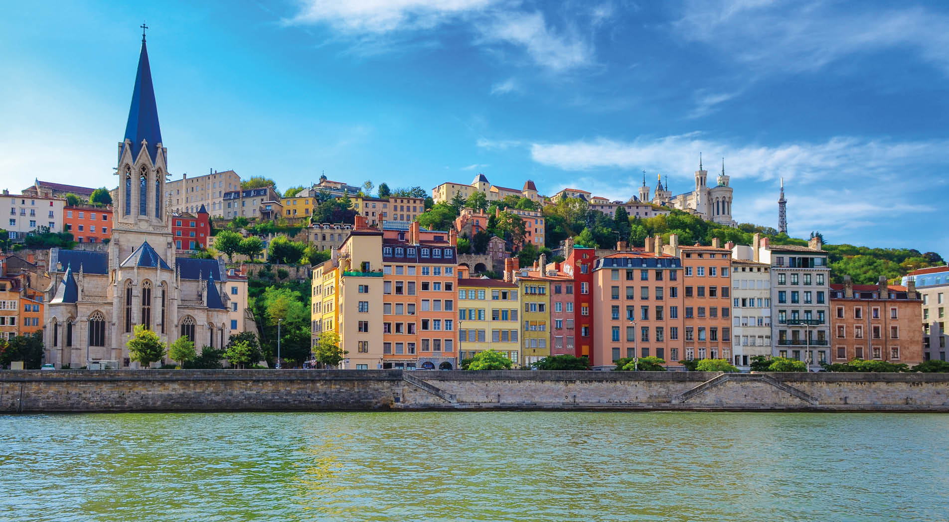 Lyon cityscape from Saone river with colorful houses and river, France