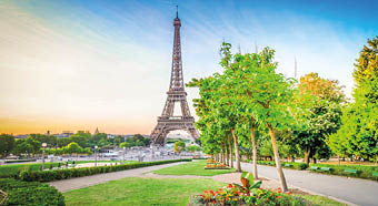 Paris Eiffel Tower and Trocadero garden at sunrise in Paris, France. Web banner format. Eiffel Tower is one of the most iconic landmarks of Paris at early morning