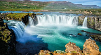 The Godafoss (Icelandic: waterfall of the gods) is a famous waterfall in Iceland. The breathtaking landscape of Godafoss waterfall attracts tourist to visit the Northeastern Region of Iceland.