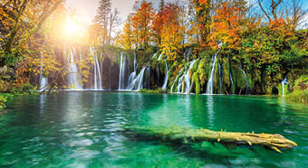 Stunning colorful autumn landscape with spectacular lake and waterfalls in Plitvice lakes National Park, Croatia, Europe