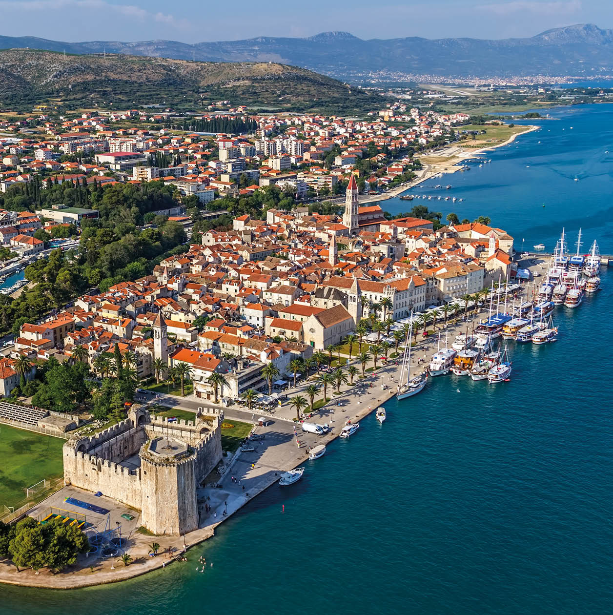 Trogir old town panorama with Kamerlengo Castle in front.