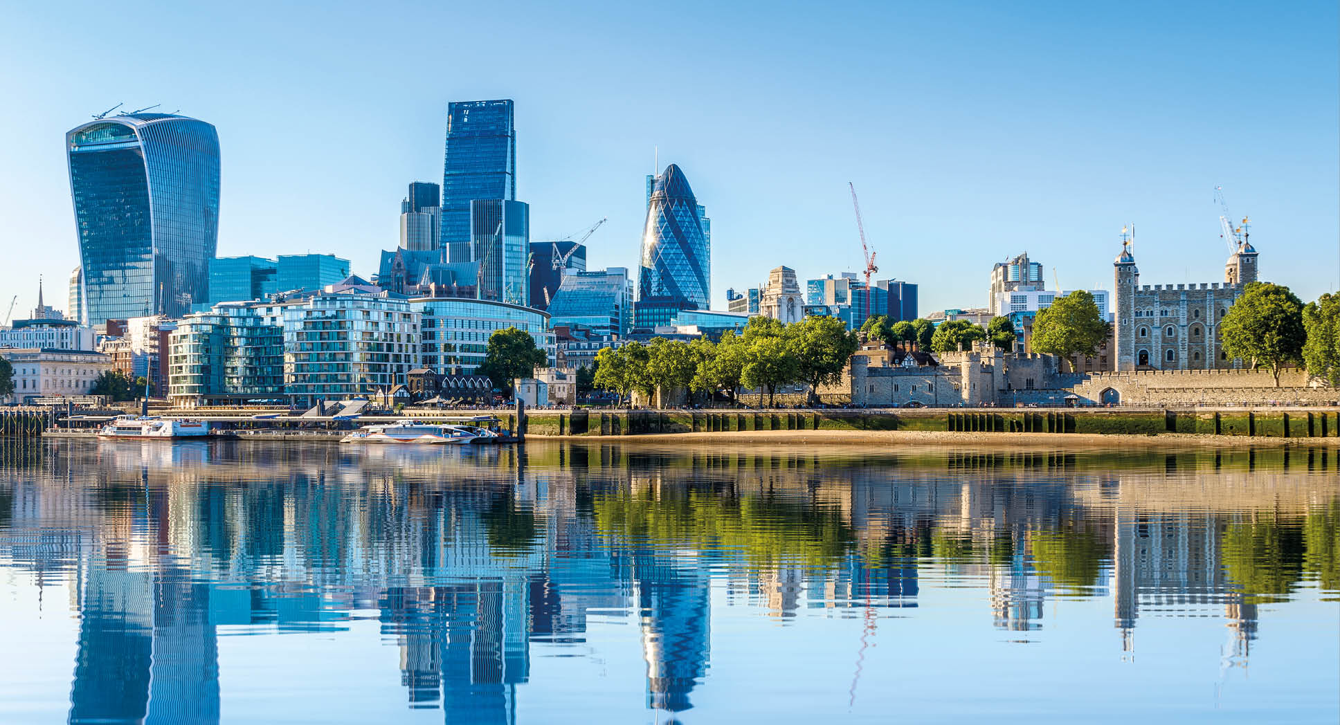 Cloudless day at financial district of London, including The Gherkin, Fenchurch building and Leadenhall building