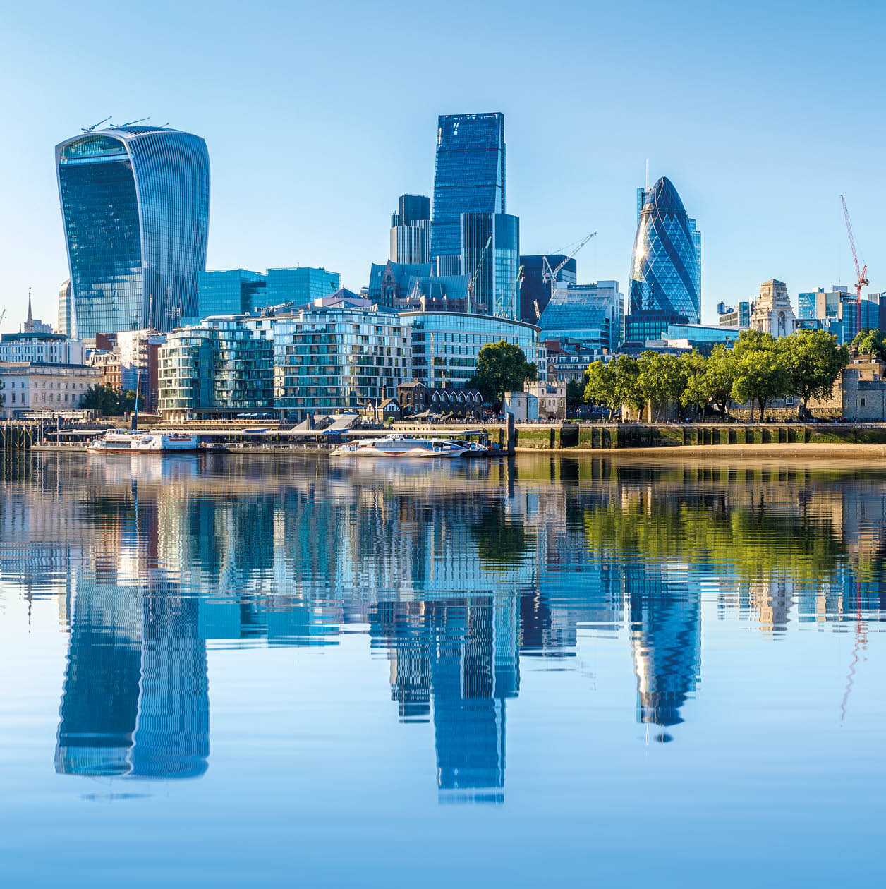 Cloudless day at financial district of London, including The Gherkin, Fenchurch building and Leadenhall building