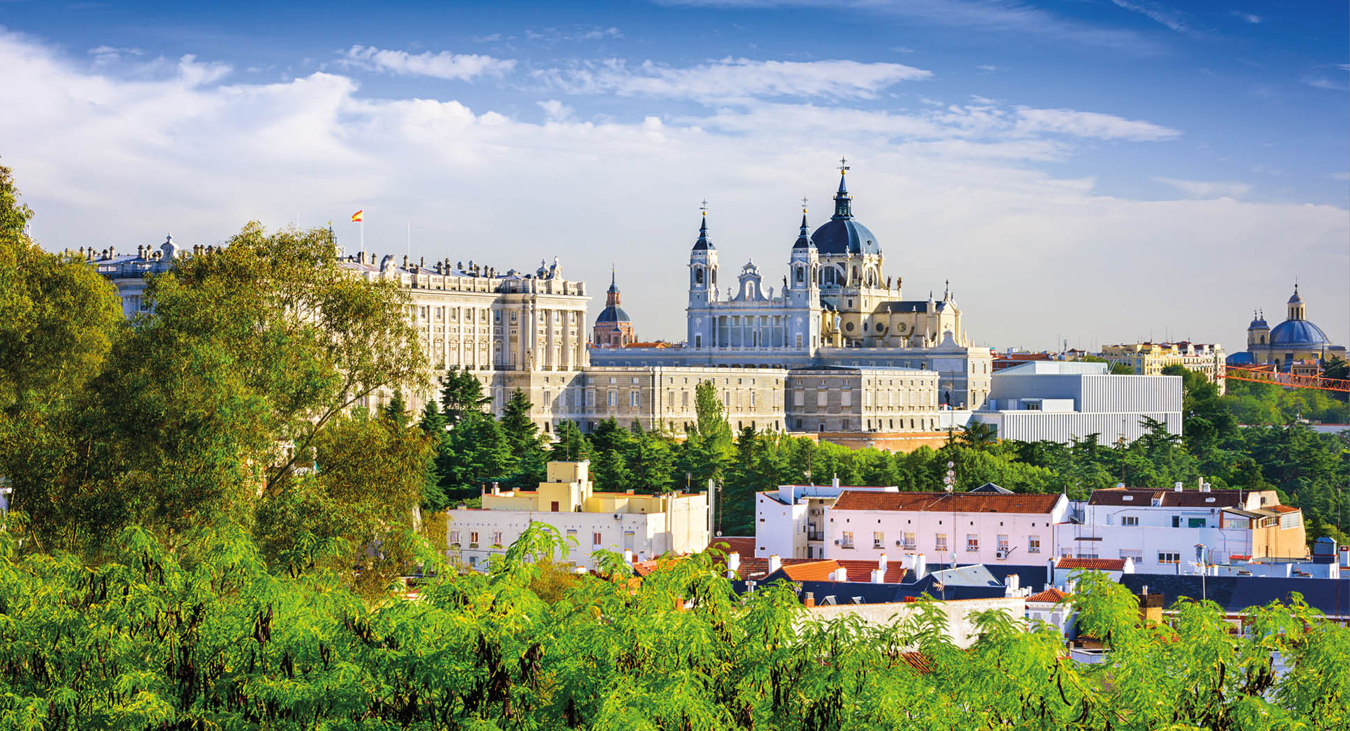 Madrid, Spain skyline at Santa Maria la Real de La Almudena Cathedral and the Royal Palace.
