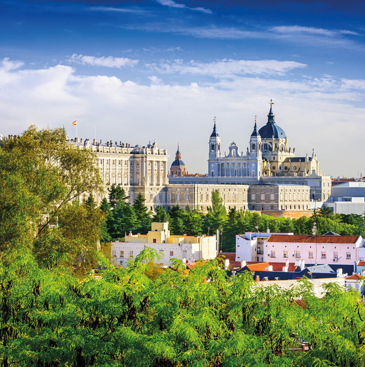 Madrid, Spain skyline at Santa Maria la Real de La Almudena Cathedral and the Royal Palace.