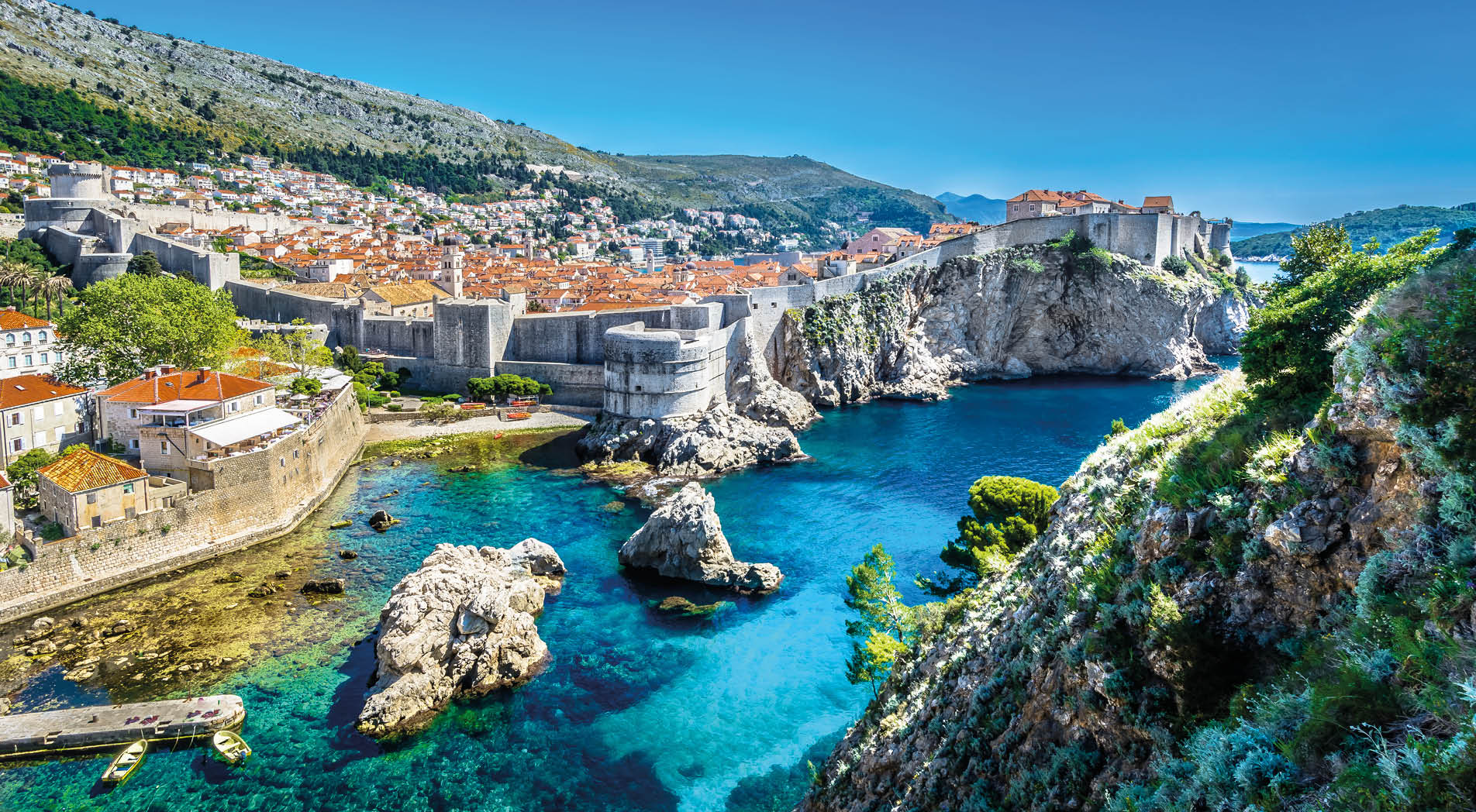 Aerial panoramic view at famous european travel destination, Dubrovnik cityscape on Adriatic Coast, Croatia.