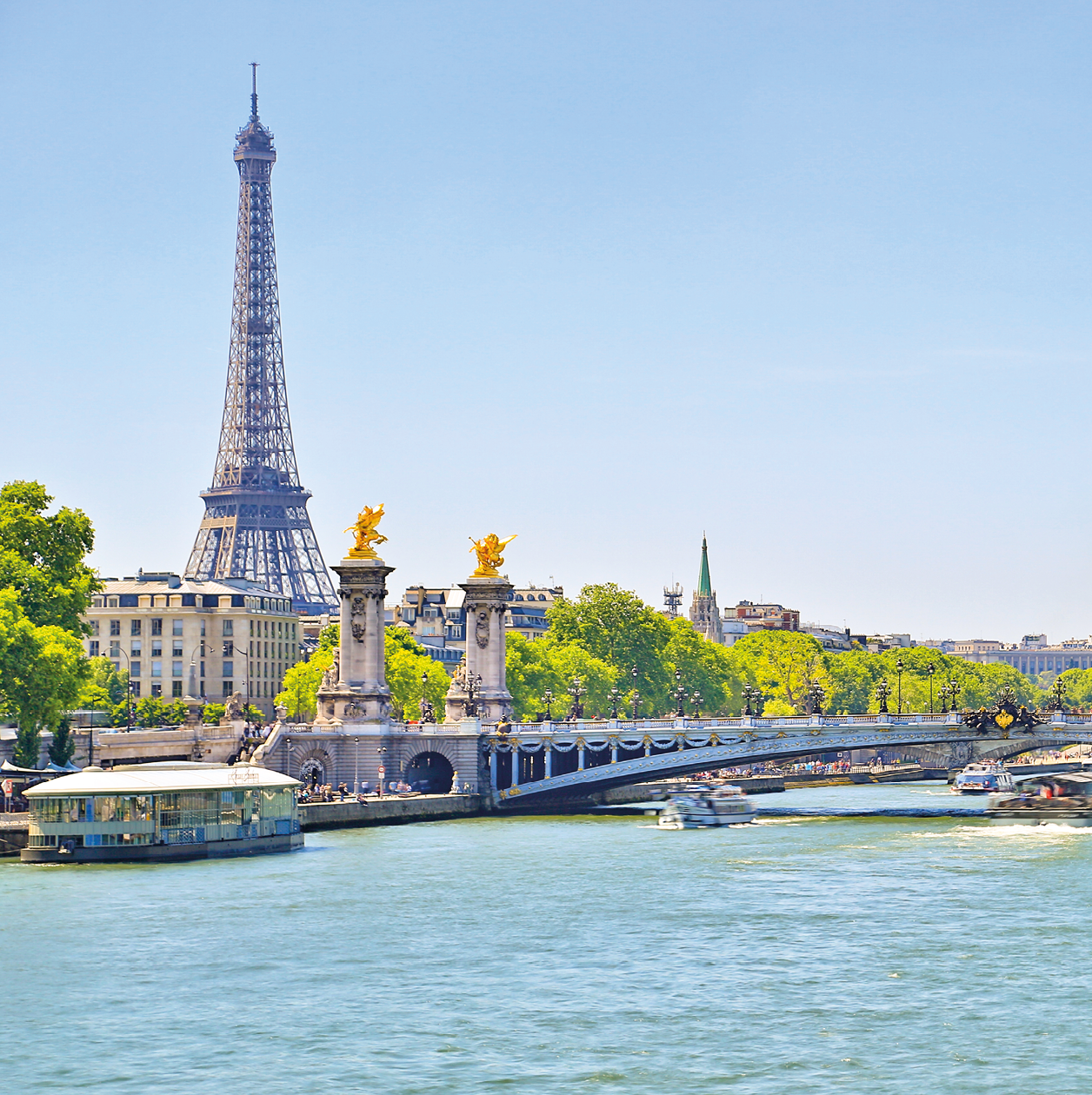 Eiffel Tower and Bridge Alexandre III over Seine River, Paris