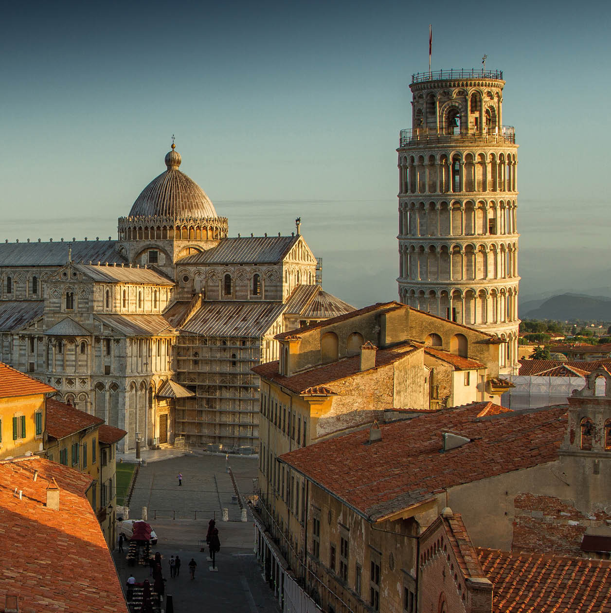 A view of Pisa's Cathedral Square, featuring the Cathedral, the Tower and the Baptistery, taken just after sunrise.