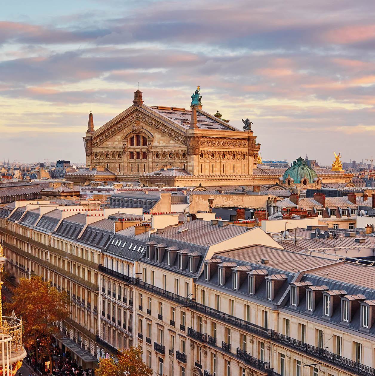 Beautiful Parisian skyline with Opera Garnier with dramatic colorful sunset