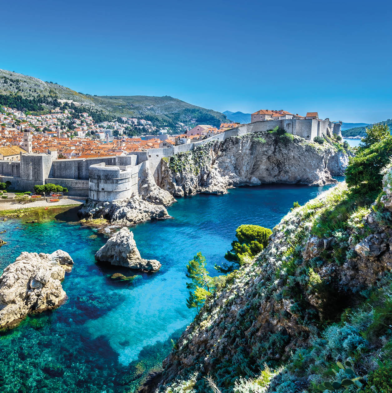 Aerial panoramic view at famous european travel destination, Dubrovnik cityscape on Adriatic Coast, Croatia.