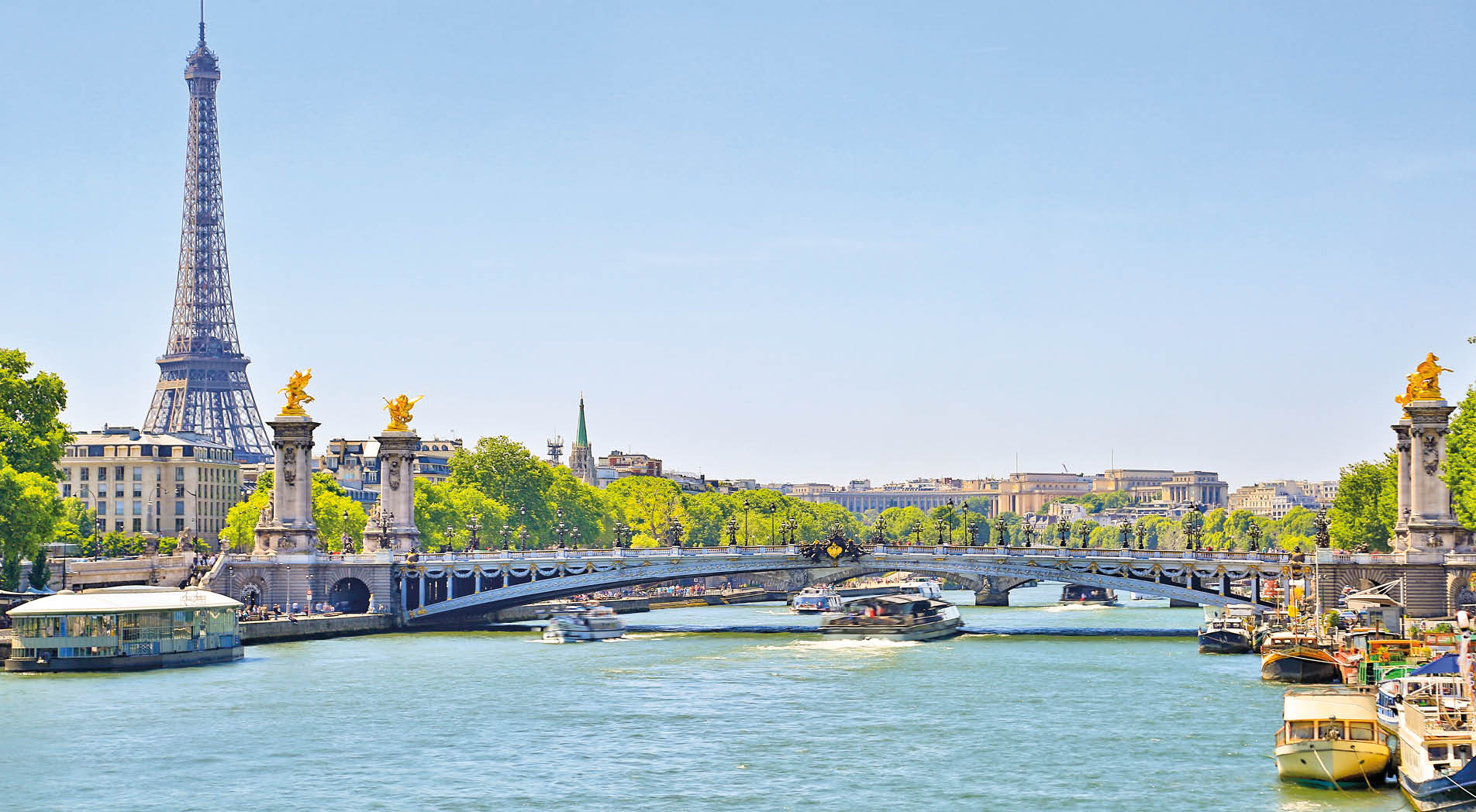Eiffel Tower and Bridge Alexandre III over Seine River, Paris
