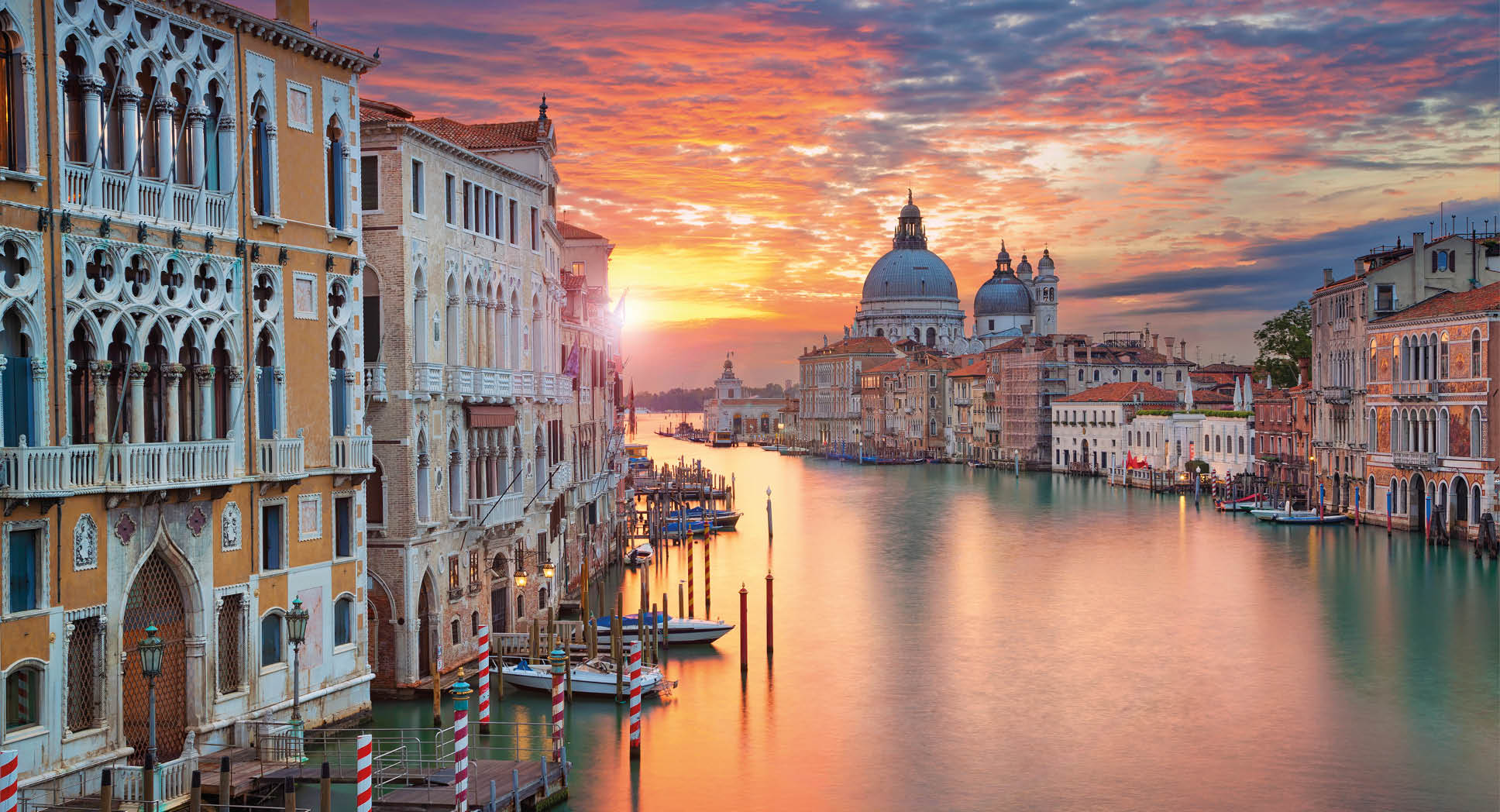 Image of Grand Canal in Venice, with Santa Maria della Salute Basilica in the background.