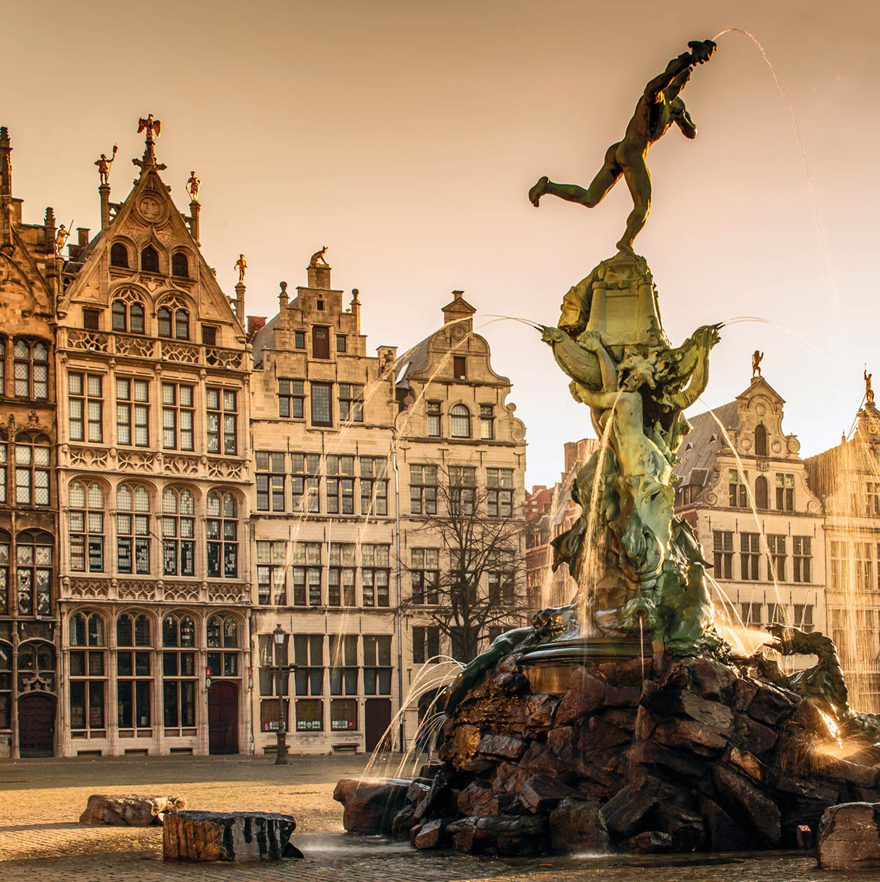 Brabo fountain in front of the town hall on the Great Market Square of Antwerp, Belgium