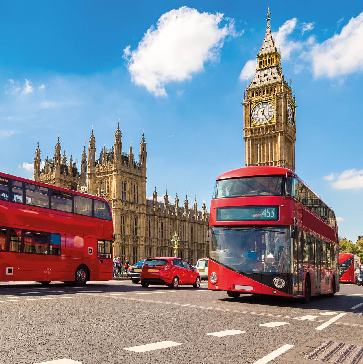 Big Ben, Westminster Bridge and red double decker bus in London, England, United Kingdom