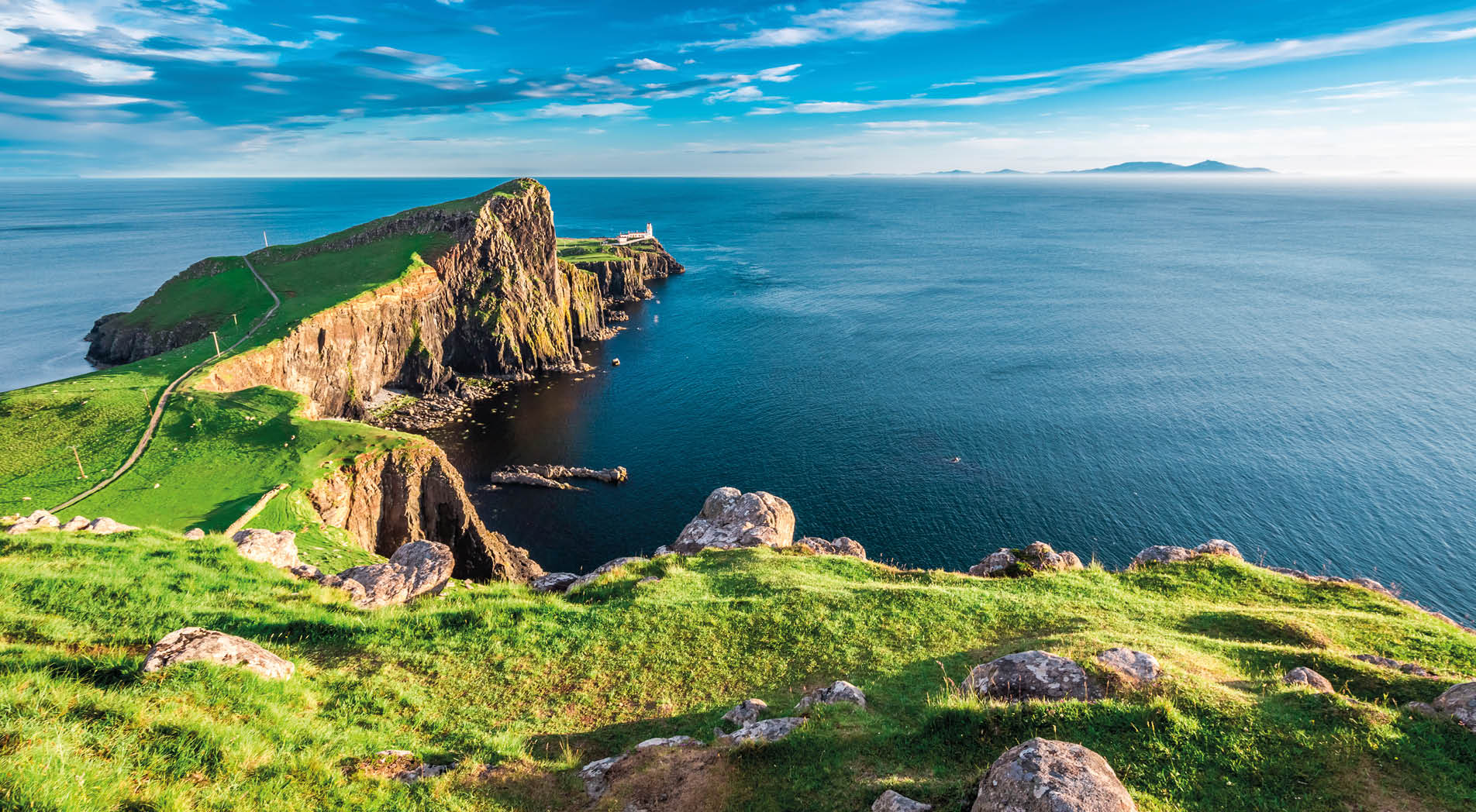 Stunning dusk at the Neist point lighthouse in Isle of Skye, Scotland