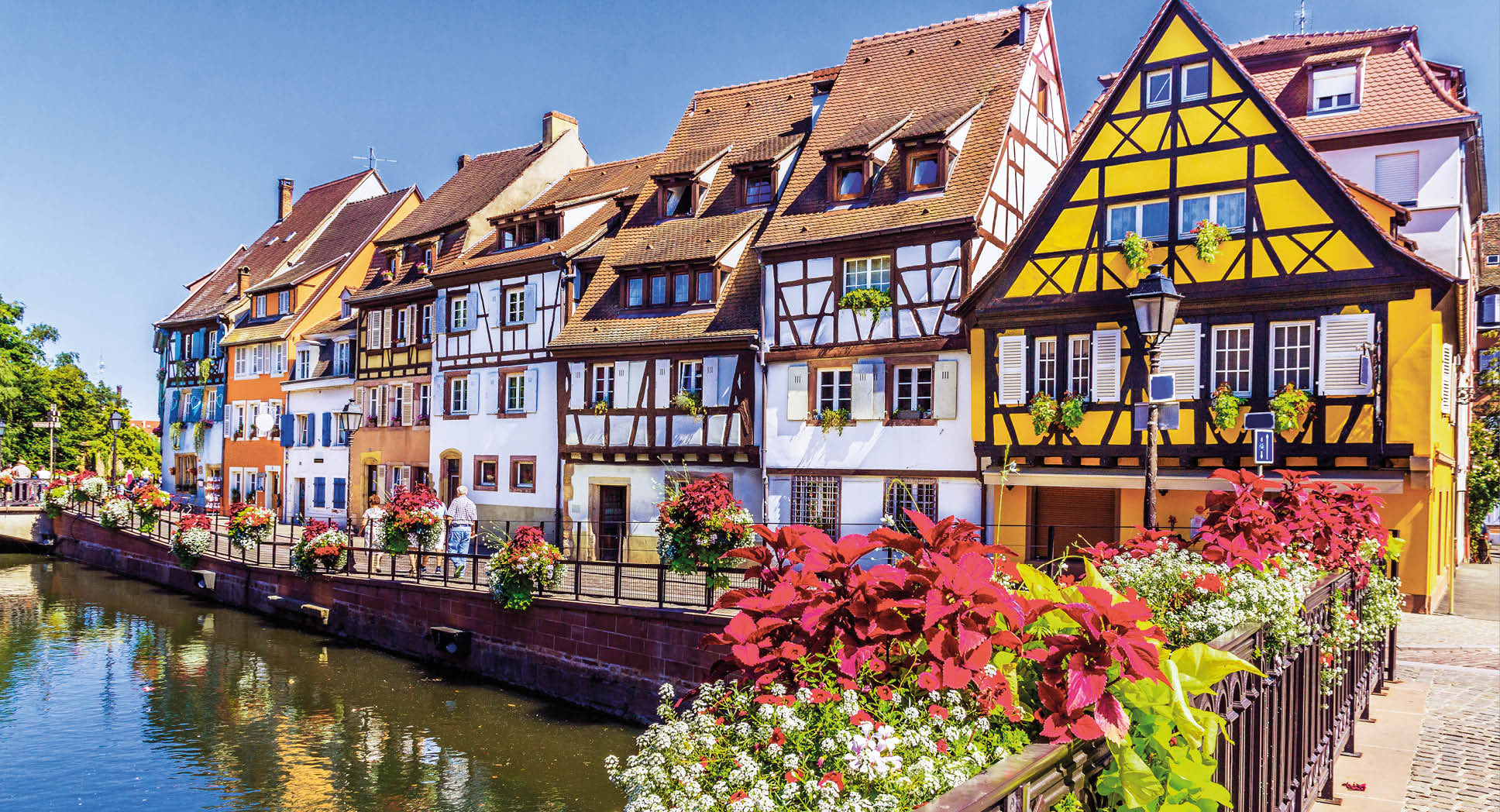 Colmar, Alsace, France. Petit Venice, water canal and traditional half timbered houses.