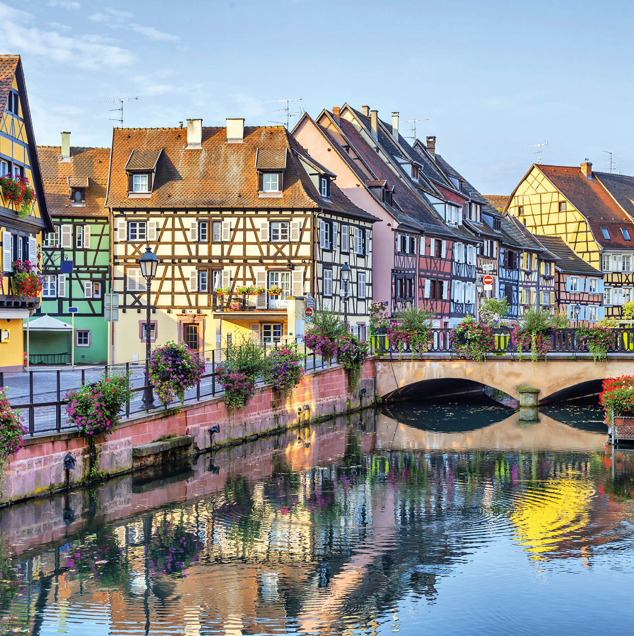 Colorful traditional french houses on the side of river Lauch in Petite Venise, Colmar, France