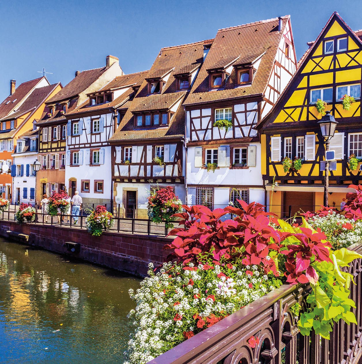 Colmar, Alsace, France. Petit Venice, water canal and traditional half timbered houses.