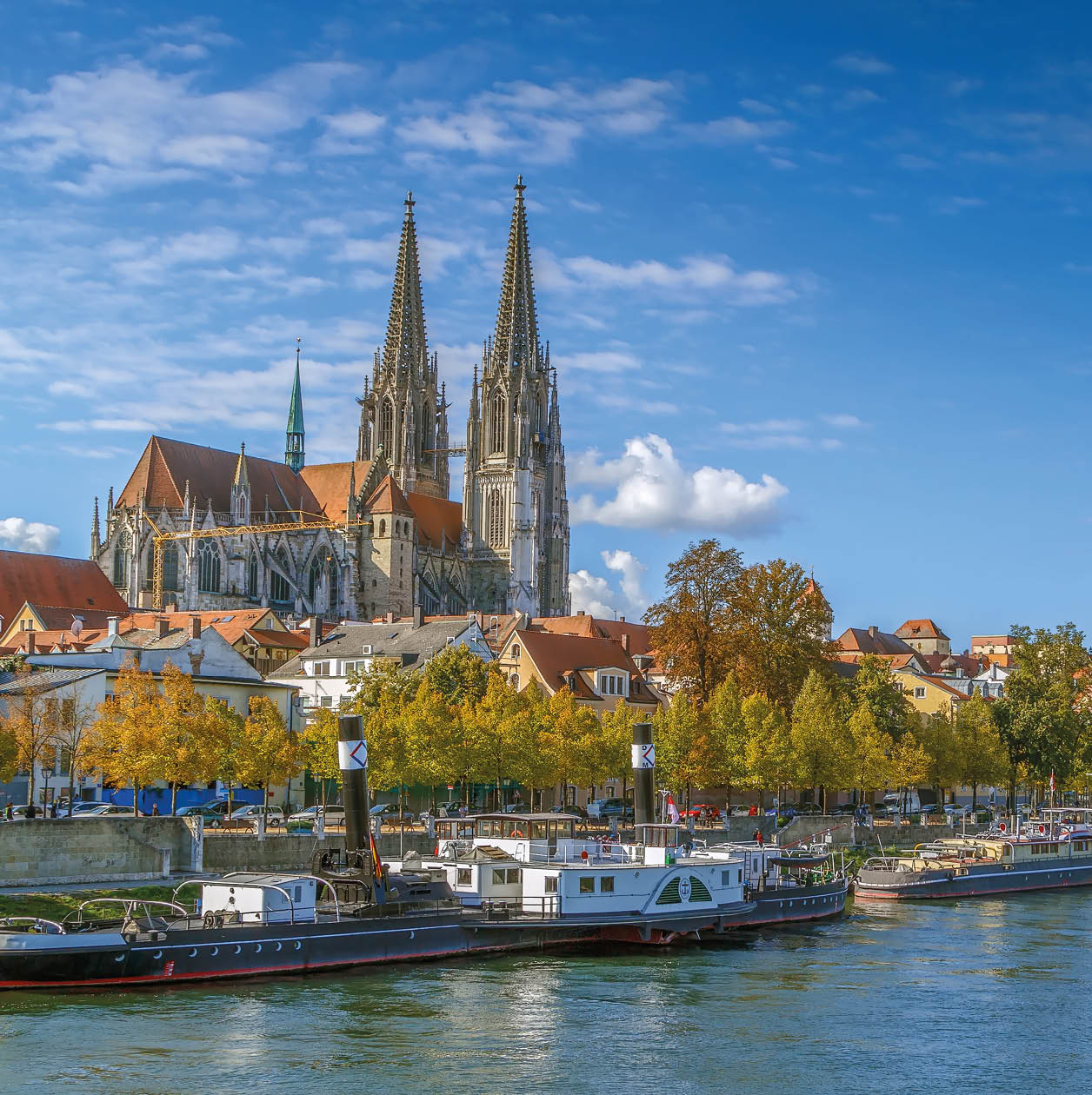 View of old town of Regensburg with st. Peter Cathedral from Danube river, Germany