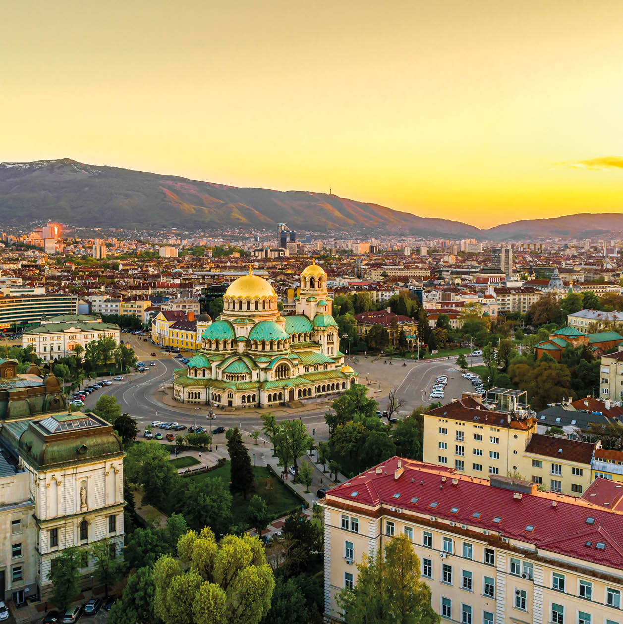 Beautiful drone shot of downtown district of Sofia, Bulgaria, St. Alexader Nevski Cathedral in the middle, gold colored domes. (Bulgarian: Красив кадър от дрон на централната част на София, България, храм-паметник Свети Александър Невски в средата, златни куполи/кубета). The photo is taken with drone DJI Phantom 4 Pro.