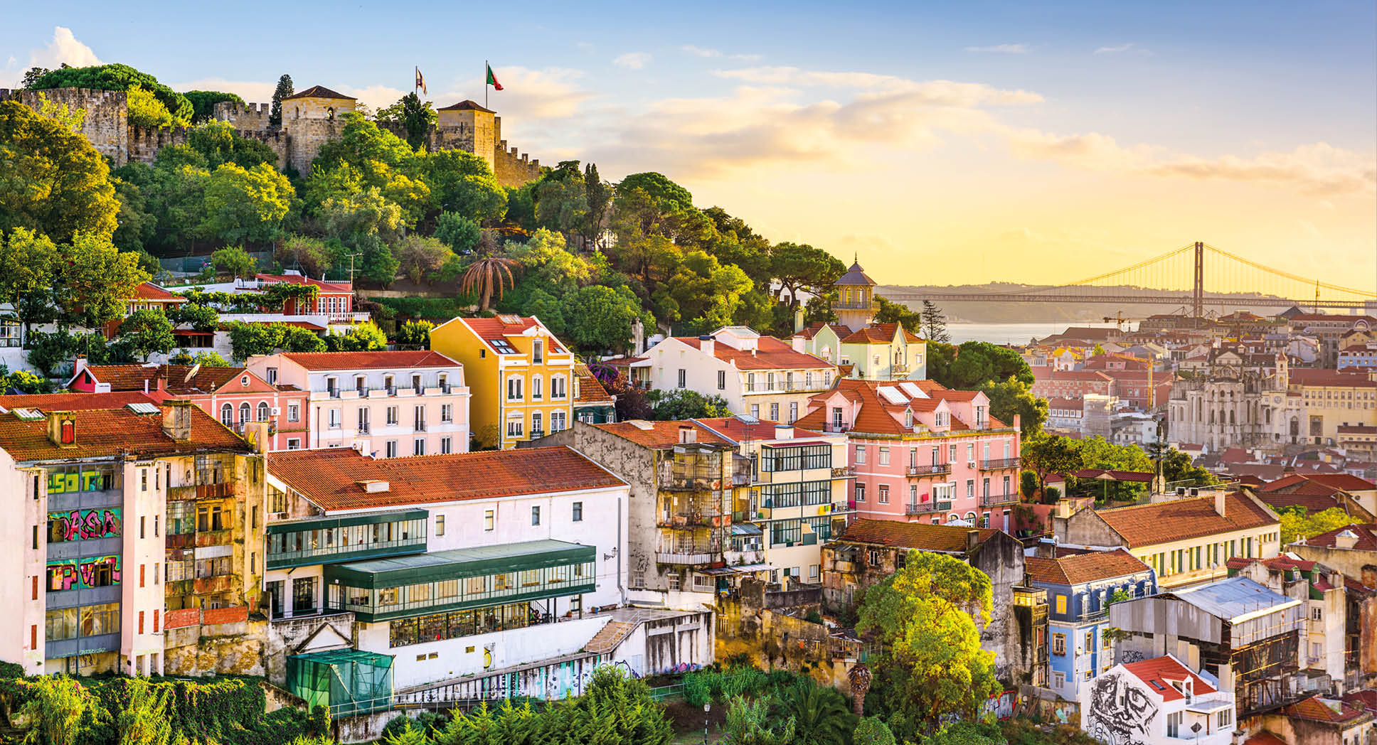 Lisbon, Portugal old town cityscape at dusk.